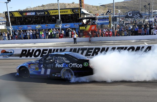 NASCAR, Subway Fresh Fit 500 2012, Denny Hamlin burn his tyres after success in race NASCAR, Subway Fresh Fit 500 2012, Denny Hamlin burn his tyres after success in race
