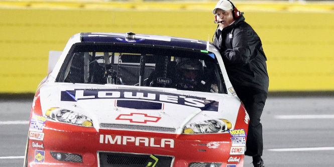 Rick Hendrick goes along for the ride as Jimmie Johnson celebrates his All-Star victory