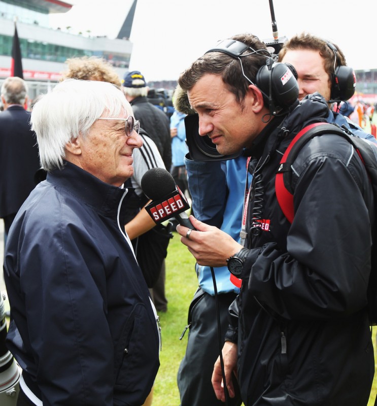 Bernie Ecclestone speaking with correspondent.