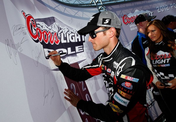 Kasey Kahne, driver of the #5 HendrickCars.com Chevrolet, signs the wall after qualifying for the pole position in the NASCAR Sprint Cup Series 500 mile race at Talladega.