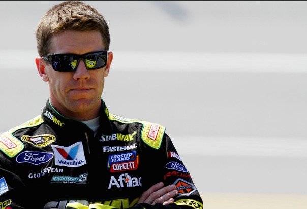 Carl Edwards, driver of the #99 Subway Ford, stands on the grid during qualifying at Talladega fall race 2012