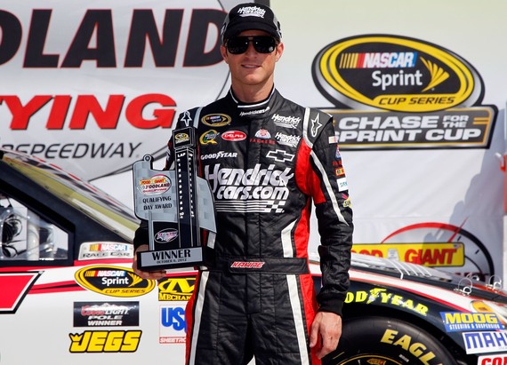 Kasey Kahne, driver of the #5 HendrickCars.com Chevrolet, poses after qualifying for the pole position at Talladega fall race 2012