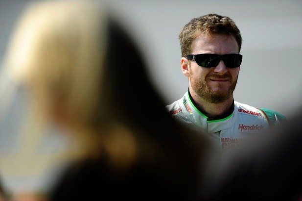 Dale Earnhardt Jr., driver of the #88 Diet Mountain Dew Chevrolet, stands on the grid during qualifying at Taladega fall race 2012