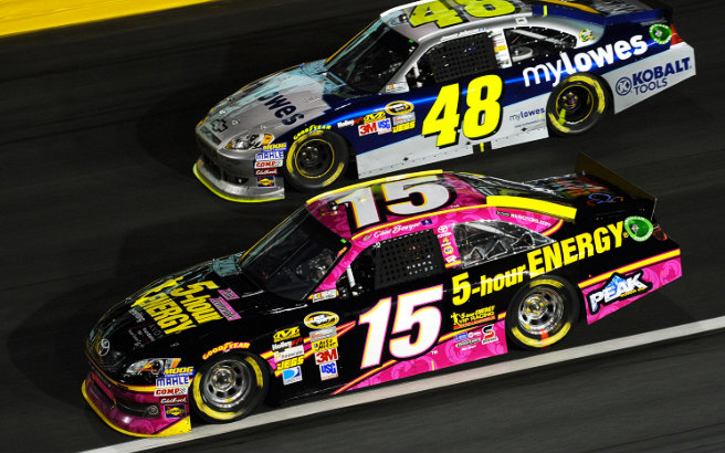 The top three Chase contenders do battle at Charlotte Motor Speedway. But Clint Bowyer emerges victorious in a fuel-mileage finish, holding off Denny Hamlin.