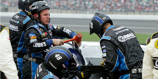 Jimmie Johnson's crew put the hammer down, literally, to help save his day at Kansas Speedway last weekend of 2012. Johnson's experience provides calm in storm. No. 48 driver looks to 'get into Keselowski's head' down the Cha