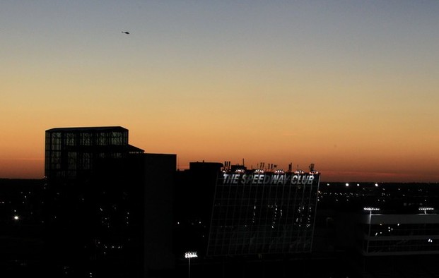 FORT WORTH, TX - NOVEMBER 02: The sun sets over The Speedway Club at Texas Motor Speedway on November 2, 2012 in Fort Worth, Texas. 
