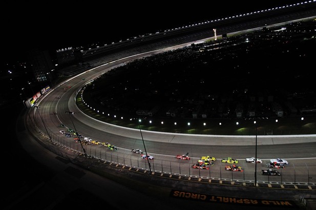 FORT WORTH, TX - NOVEMBER 02: Trucks race during the NASCAR Camping World Truck Series WinStar World Casino 350k at Texas