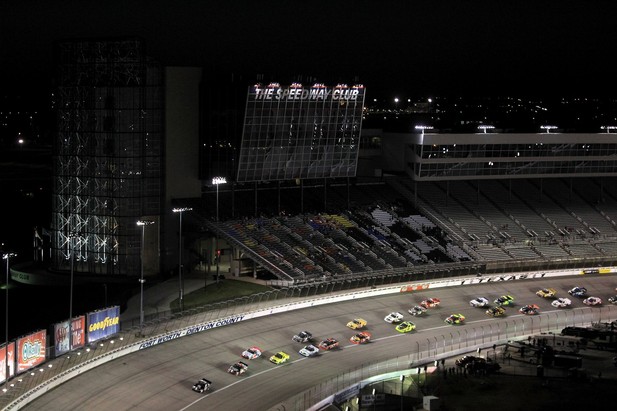 FORT WORTH, TX - NOVEMBER 02: Nelson Piquet Jr., driver of the #30 TAG Heuer Avant-Garde Eyewear Chevrolet, leads the field during the NASCAR Camping World Truck Series WinStar World Casino 350k at Texas