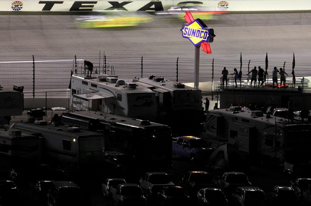FORT WORTH, TX - NOVEMBER 02: Fans watch during the NASCAR Camping World Truck Series WinStar World Casino 350k at Texas