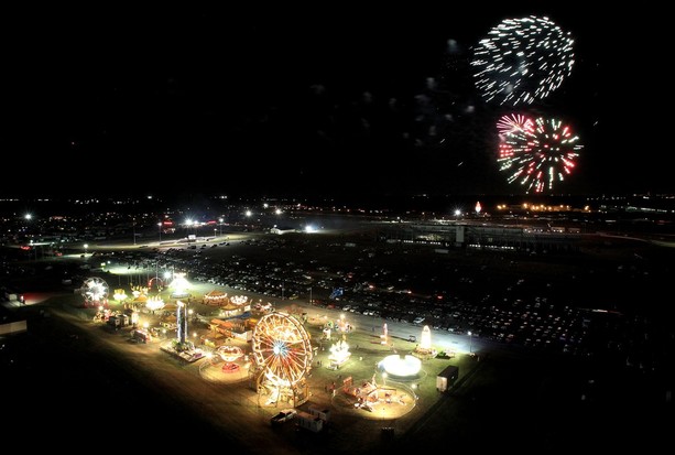 FORT WORTH, TX - NOVEMBER 02: Fireworks are seen over the Carnival area during the NASCAR Camping World Truck Series WinStar World Casino 350k at Texas