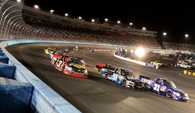 AVONDALE, AZ - NOVEMBER 09: James Buescher, driver of the #31 Exide Batteries Chevrolet, Ty Dillon, driver of the #3 Bass Pro Shops/Tracker Boats Chevrolet, and German Quiroga, driver of the #51 NET10 Wireless Toyota, drive during the NASCAR Camping 
