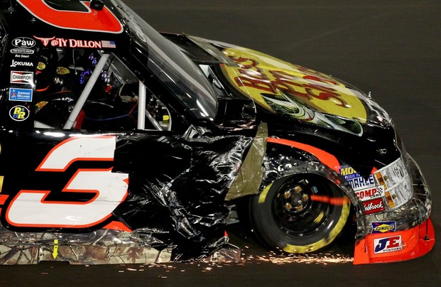 AVONDALE, AZ - NOVEMBER 09: Ty Dillon, driver of the #3 Bass Pro Shops/Tracker Boats Chevrolet, drives with damage after an on-track incident during the NASCAR Camping World Truck Series Lucas Oil 150 at Phoenix International Raceway on November 9, 2