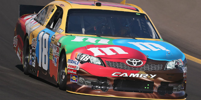 Busch sets track record in winning pole at Phoenix - Kyle Busch is dialed in at Phoenix: he led opening practice before bettering his time in qualifying.