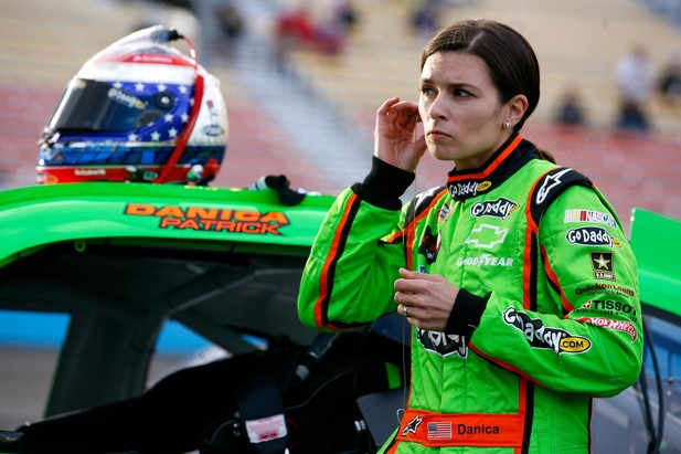AVONDALE, AZ - NOVEMBER 09: Danica Patrick, driver of the #10 GoDaddy.com Chevrolet, stands on the grid during qualifying for the NASCAR Sprint Cup Series AdvoCare 500 at Phoenix International Raceway on November 9, 2012 in Avondale, Arizona.