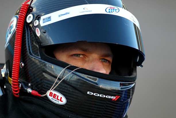 AVONDALE, AZ - NOVEMBER 09: Brad Keselowski, driver of the #2 Miller Lite Dodge, stands on the grid during qualifying for the NASCAR Sprint Cup Series AdvoCare 500 at Phoenix International Raceway on November 9, 2012 in Avondale, Arizona. 