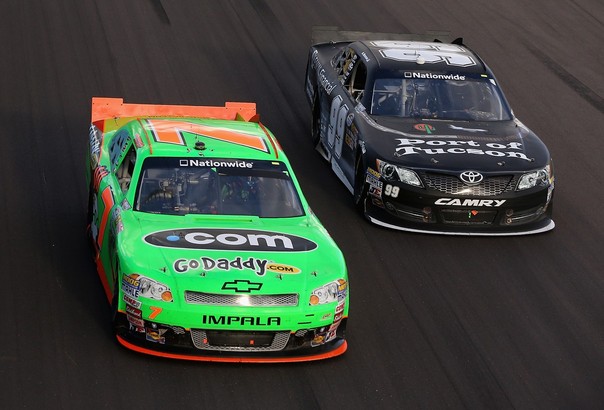 AVONDALE, AZ - NOVEMBER 10: Danica Patrick, driver of the #7 GoDaddy.com Chevrolet, races Alex Bowman, driver of the #99 Port of Tucson/Levin Financial Toyota, during the NASCAR Nationwide Series Great Clips 200 at Phoenix