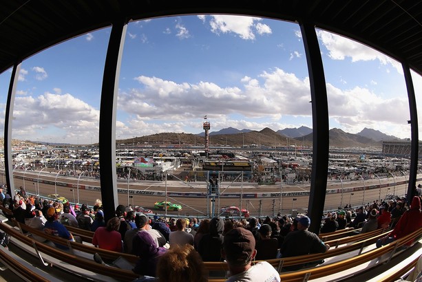 AVONDALE, AZ - NOVEMBER 10: Fans watch the NASCAR Nationwide Series Great Clips 200 at Phoenix International Raceway