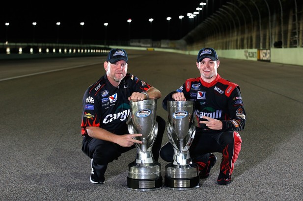 Ricky Stenhouse Jr., driver of the #6 Cargill Ford, and crew chief Mike Kelley pose on the track after winning back-to-back Nationwide series championships after competing in the NASCAR Nationwide Series Ford EcoBoost 300 at Homestead