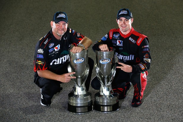 Ricky Stenhouse Jr., driver of the #6 Cargill Ford, and crew chief Mike Kelley pose on the track after winning back-to-back Nationwide series championships after competing in the NASCAR Nationwide Series Ford EcoBoost 300 at Homestead