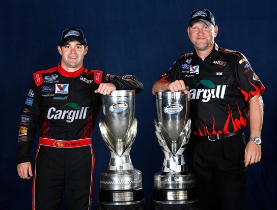 Ricky Stenhouse Jr., driver of the #6 Cargill Ford, and crew chief Mike Kelley pose on the track after winning back-to-back Nationwide series championships after competing in the NASCAR Nationwide Series Ford EcoBoost 300 at Homestead