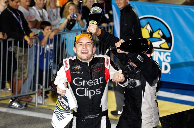 James Buescher, driver of the #31 Great Clips Chevrolet, celebrates in Champions Victory Lane after winning the Series Championship and finishing in thirteenth place in the NASCAR Camping World Truck Series Ford EcoBoost 200 at Homestead