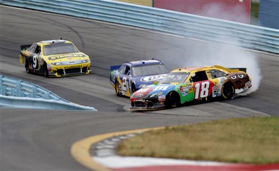 2012 Season in Review: Marcos Ambrose came from behind to on the final lap to overtake Kyle Busch and Brad Keselowski on an oil-soaked track to win the 