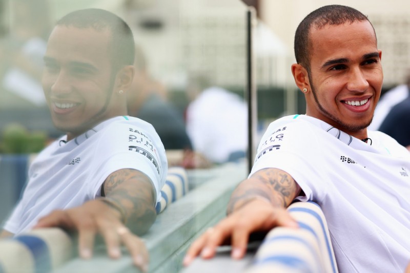 Lewis Hamilton of Great Britain and Mercedes GP is interviewed by the media during previews to the Australian Formula One Grand Prix at the Albert Park Circuit.