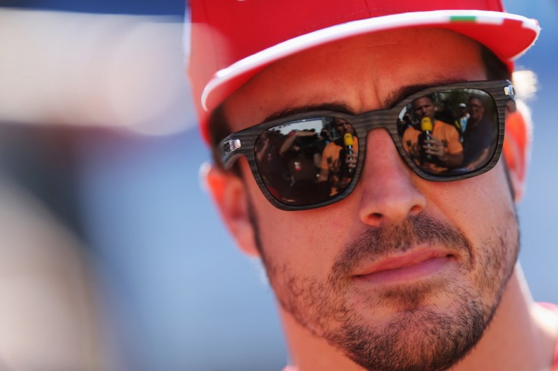 Fernando Alonso of Spain and Ferrari is interviewed by the media during previews to the Australian Formula One Grand Prix at the Albert Park Circuit on March 14, 2013 in Melbourne, Australia.
