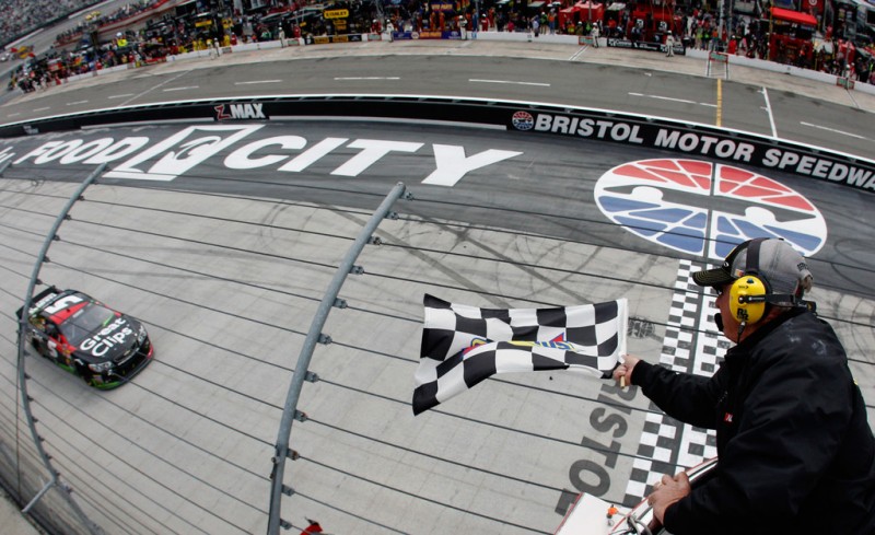 Kasey Kahne, driver of the #5 Great Clips Chevrolet, takes the checkered flag to win the NASCAR Sprint Cup Food City 500 at Bristol Motor Speedway on March 17, 2013 in Bristol, Tennessee.