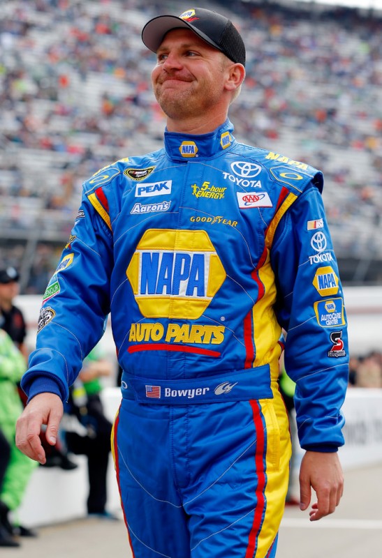 Clint Bowyer, driver of the #15 NAPA Filters Toyota, stands on the grid prior to the NASCAR Sprint Cup Series Food City 500 at Bristol Motor Speedway on March 17, 2013 in Bristol, Tennessee. 