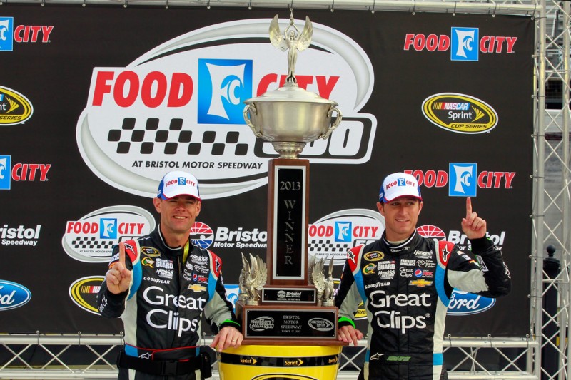 Kasey Kahne (R), driver of the #5 Great Clips Chevrolet, poses with crew chief Kenny Francis (L) in Victory Lane after winning the NASCAR Sprint Cup Series Food City 500 at Bristol Motor Speedway on March 17, 2013 in Bristol, Tennessee. 