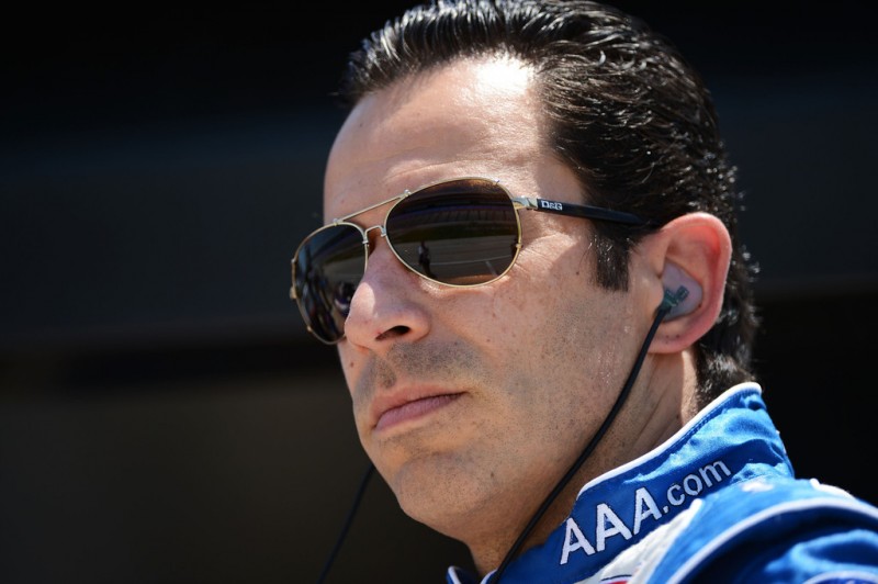 Helio Castroneves of Brazil, driver of the #3 AAA Insurance Team Penske Chevrolet Dallara , looks on during practice for the IZOD IndyCar Series Firestone 550 at Texas Motor Speedway on June 8, 2012 in Fort Worth, Texas.