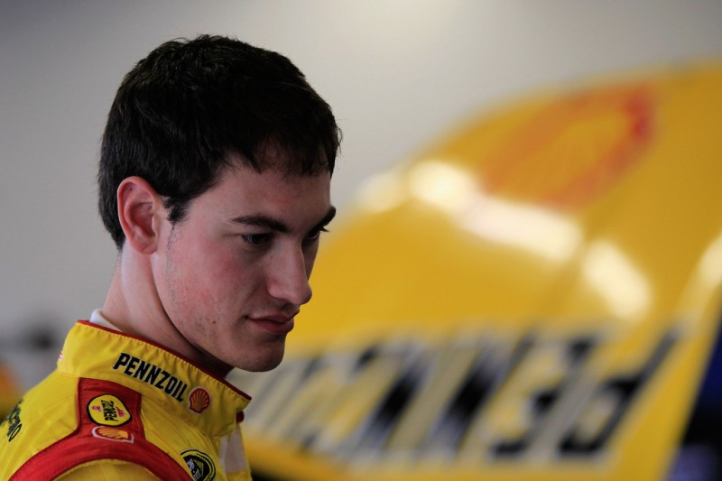 Joey Logano driver of the #22 Ford stands in the garage during NASCAR Sprint Cup Series Preseason Thunder testing at Daytona International Speedway on January 10, 2013 in Daytona Beach, Florida. Joey Logano driver of the #22 Ford stands in the garage during NASCAR Sprint Cup Series Preseason Thunder testing at Daytona International Speedway on January 10, 2013 in Daytona Beach, Florida.