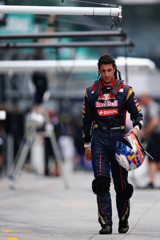 Daniel Ricciardo of Australia and Scuderia Toro Rosso walks in the pitlane following the final practice session prior to qualifying for the Malaysian Formula One Grand Prix at the Sepang Circuit on March 23, 2013 in Kuala Lumpur, Malaysia.