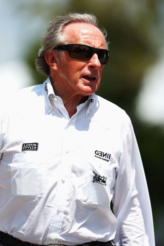 Sir Jackie Stewart is seen in the paddock following qualifying for the Malaysian Formula One Grand Prix at the Sepang Circuit on March 23, 2013 in Kuala Lumpur, Malaysia. 