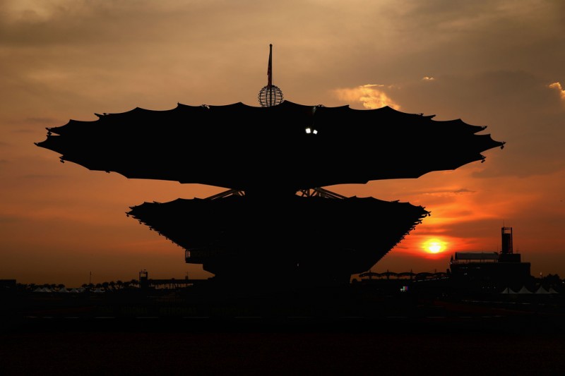The sun sets over the main grandstand following qualifying for the Malaysian Formula One Grand Prix at the Sepang Circuit on March 23, 2013 in Kuala Lumpur, Malaysia.
