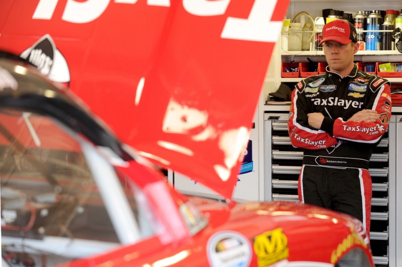 Regan Smith, driver of the #7 TaxSlayer.com Chevrolet, looks on during practice for the NASCAR Nationwide Series Royal Purple 300 at Auto Club Speedway on March 22, 2013 in Fontana, California. 