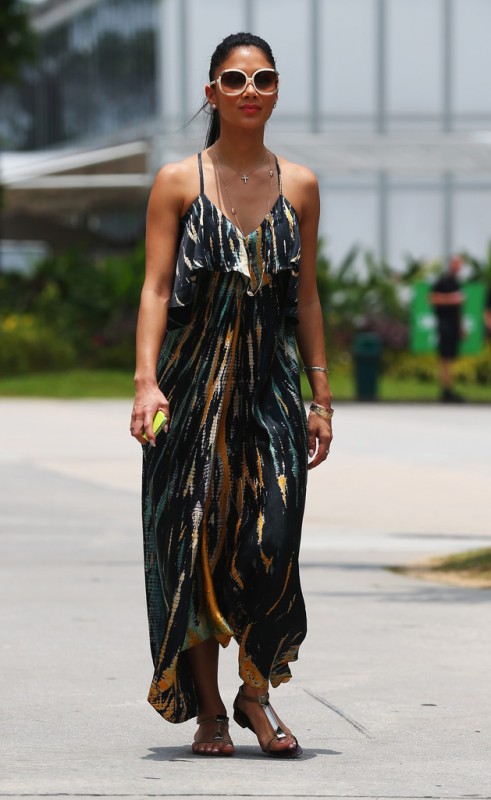 Nicole Scherzinger of the Pussycat Dolls walks in the paddock before the Malaysian Formula One Grand Prix at the Sepang Circuit on March 24, 2013 in Kuala Lumpur, Malaysia. 