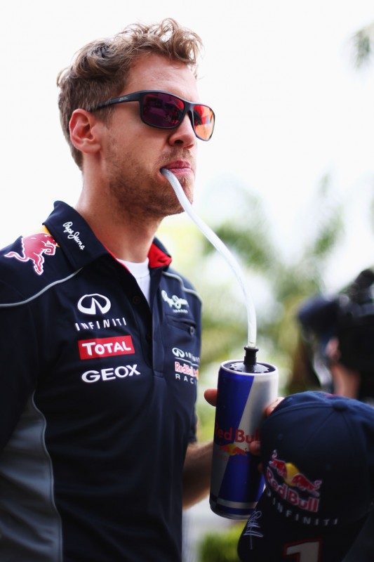 Sebastian Vettel of Germany and Infiniti Red Bull Racing attends the drivers parade before the Malaysian Formula One Grand Prix at the Sepang Circuit on March 24, 2013 in Kuala Lumpur, Malaysia. 