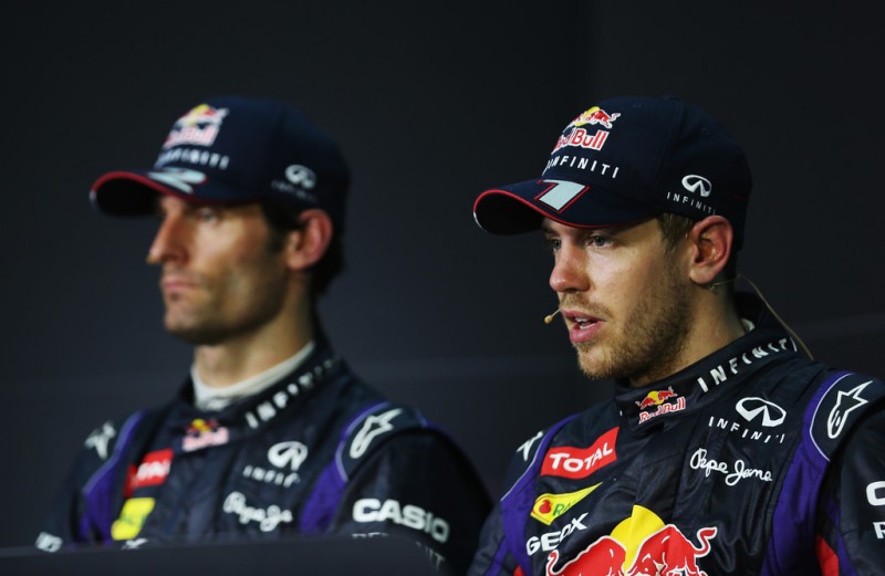 Race winner Sebastian Vettel (R) of Germany and Infiniti Red Bull Racing and second placed Mark Webber (L) of Australia and Infiniti Red Bull Racing react in the drivers press conference following the Malaysian Formula One Grand Prix at the Sepang Ci