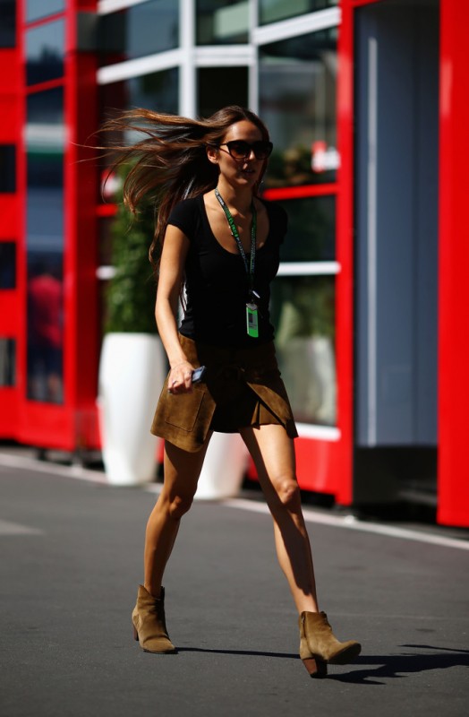 Jessica Michibata, girlfriend of Jenson Button of Great Britain and McLaren, walks in the paddock before the German Grand Prix at the Nuerburgring on July 7, 2013 in Nuerburg, Germany. 