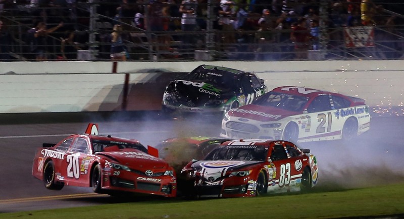 Matt Kenseth, driver of the #20 Home Depot / Husky Toyota, David Reutimann, driver of the #83 Burger King / Dr. Pepper Toyota, Jeff Gordon, driver of the #24 Axalta Coating Systems Chevrolet, and Denny Hamlin, driver of the #11 FedEx Ground Toyota, c
