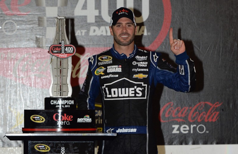 Jimmie Johnson, driver of the #48 Lowe's Dover White Chevrolet, poses in victory lane after winning the NASCAR Sprint Cup Series Coke Zero 400 at Daytona International Speedway on July 6, 2013 in Daytona Beach, Florida. 