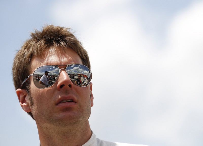 Will Power of Australia, driver of the #12 Verizon Team Penske Chevrolet waits during qualifying for the Pocono INDYCAR 400 at Pocono Raceway on July 6, 2013 in Long Pond, Pennsylvania. 