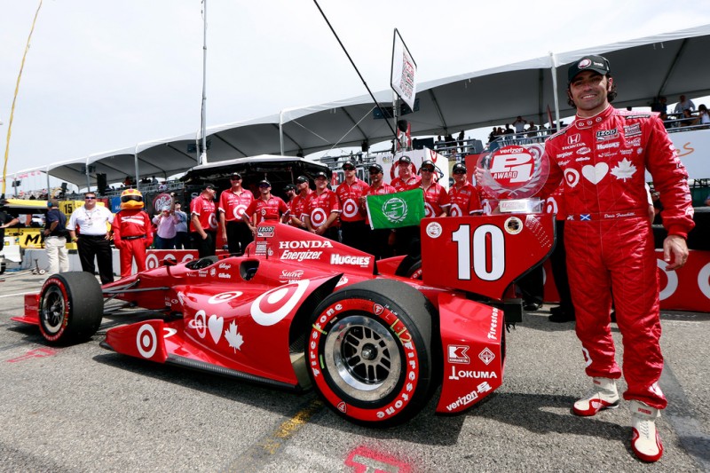 Dario Franchitti of Scotland, driver of the #10 Target Chip Ganassi Racing Honda poses with the Verizon P1 Pole Award following qualifying for the IZOD INDYCAR Series Honda Indy Toronto on July 12, 2013 in Toronto, Canada. 
