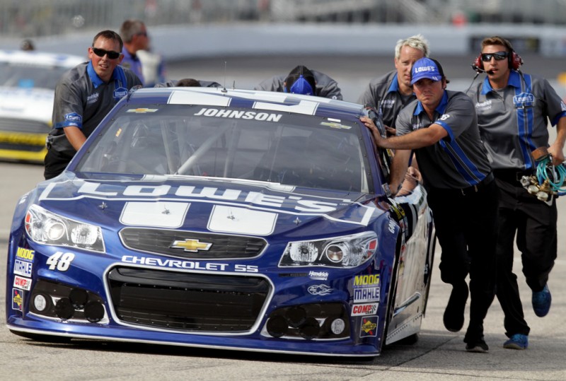 Jimmie Johnson, driver of the #48 Lowe's Chevrolet, is pushed on the grid during qualifying for the NASCAR Sprint Cup Series Camping World RV Sales 301 at New Hampshire Motor Speedway on July 12, 2013 in Loudon, New Hampshire. 