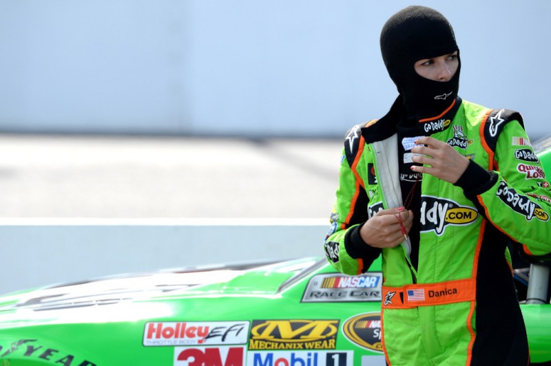 Danica Patrick, driver of the #10 GoDaddy.com Chevrolet, stands on the grid during qualifying for the NASCAR Sprint Cup Series Camping World RV Sales 301 at New Hampshire Motor Speedway on July 12, 2013 in Loudon, New Hampshire. 