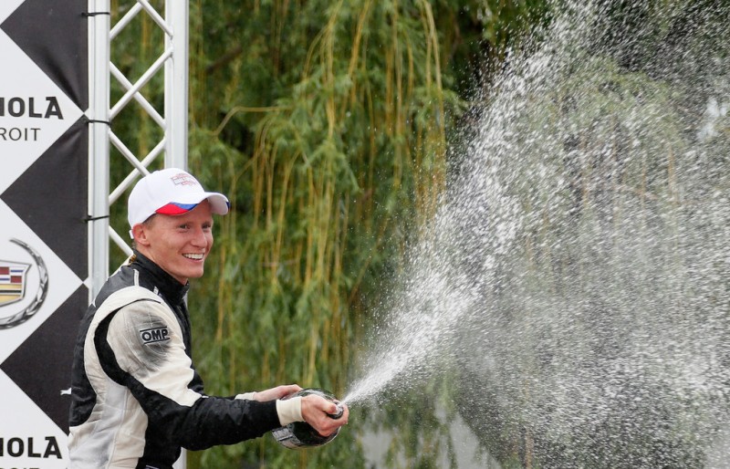 Mike Conway of England, driver of the #18 Dale Coyne Racing Honda, celebrates winning the IZOD IndyCar Series Chevrolet Indy Dual in Detroit at the Raceway at Belle Isle Park on June 1, 2013 in Detroit, Michigan.