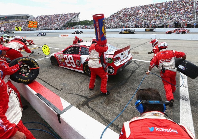 Kevin Harvick, driver of the #29 Budweiser Chevrolet, makes a pit stop during the NASCAR Sprint Cup Series Camping World RV Sales 301 at New Hampshire Motor Speedway on July 14, 2013 in Loudon, New Hampshire. 
