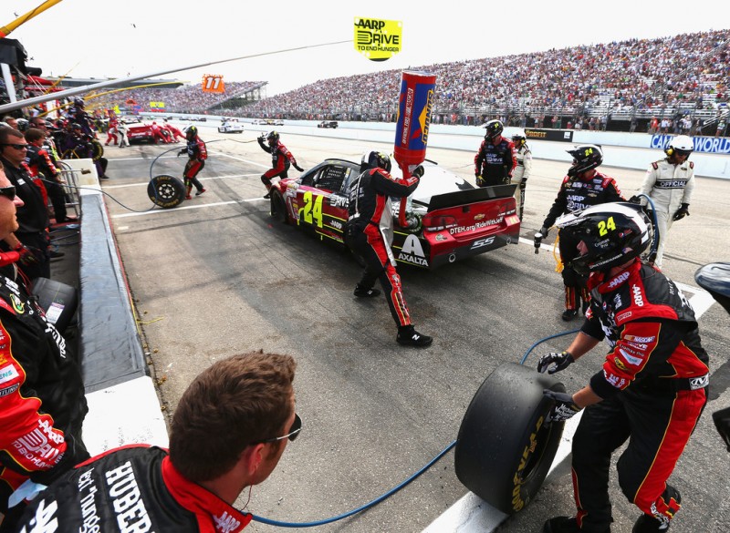 Jeff Gordon, driver of the #24 Drive To End Hunger Chevrolet, makes a pit stop during the NASCAR Sprint Cup Series Camping World RV Sales 301 at New Hampshire Motor Speedway on July 14, 2013 in Loudon, New Hampshire. 